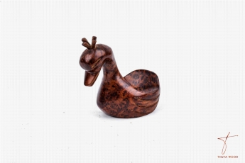 Canard sculpté en bois de thuya 